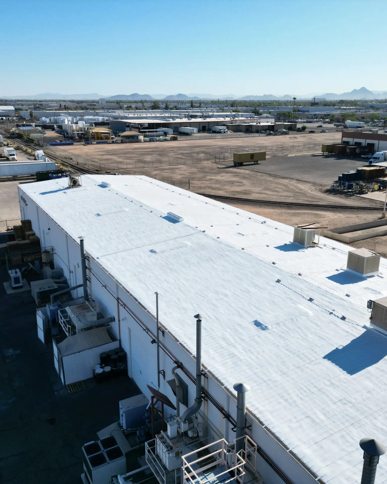 White reflective coating on a Phoenix commercial flat roof
