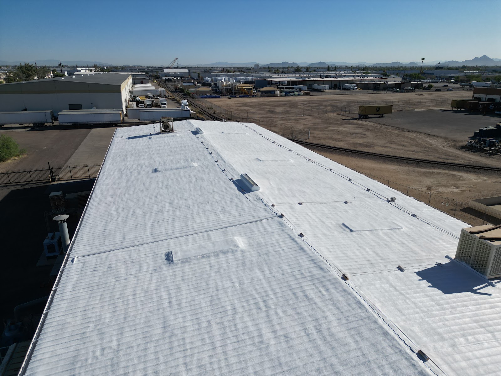 Spray Foam on a Commercial Metal Roof photo 7