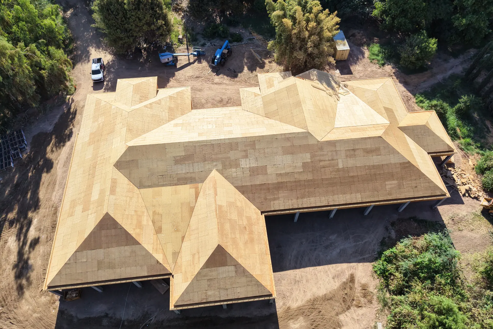 Aerial of finished roof decking on a large custom home