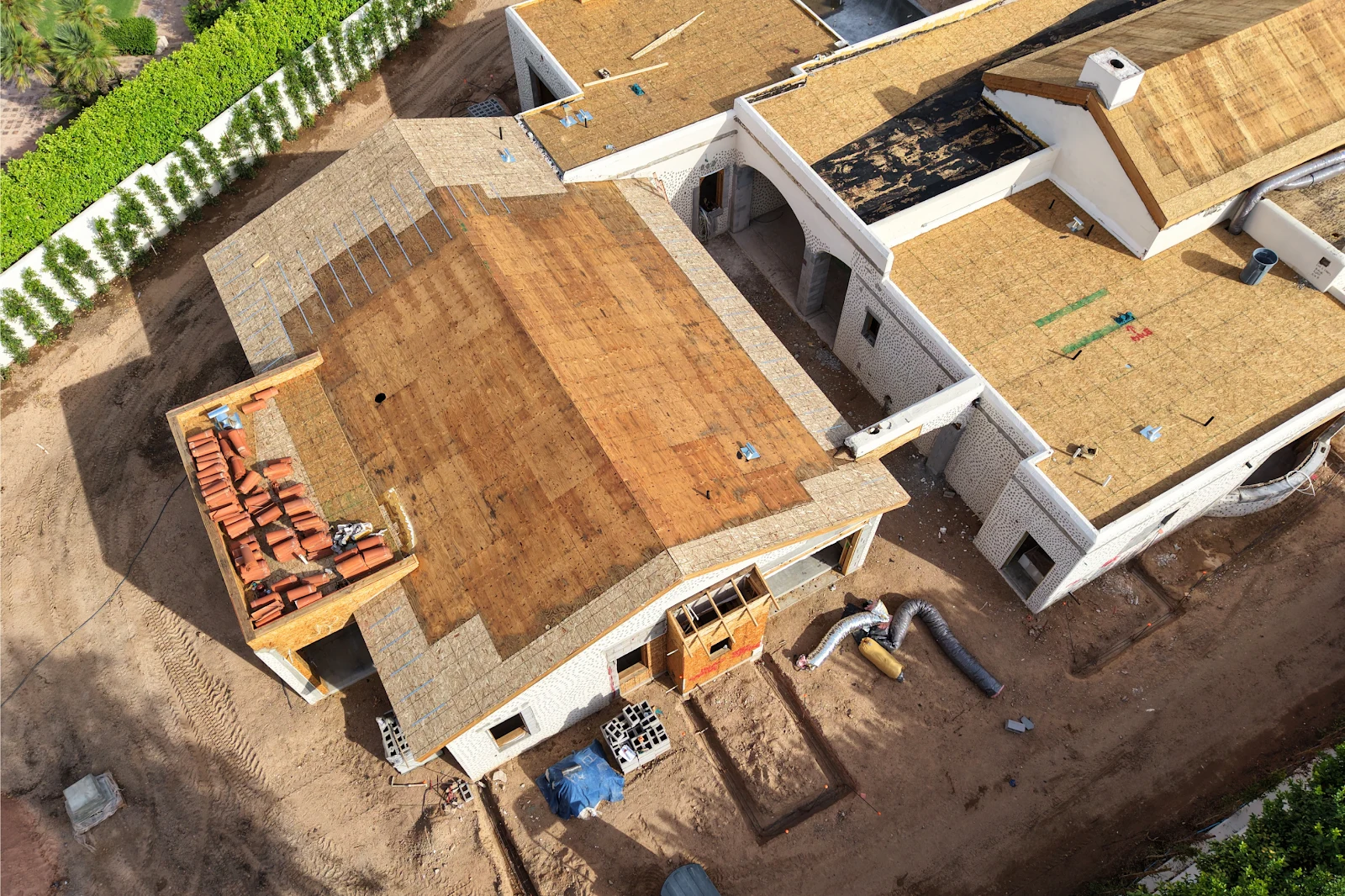 Close aerial of new roof sheathing on a custom home under construction