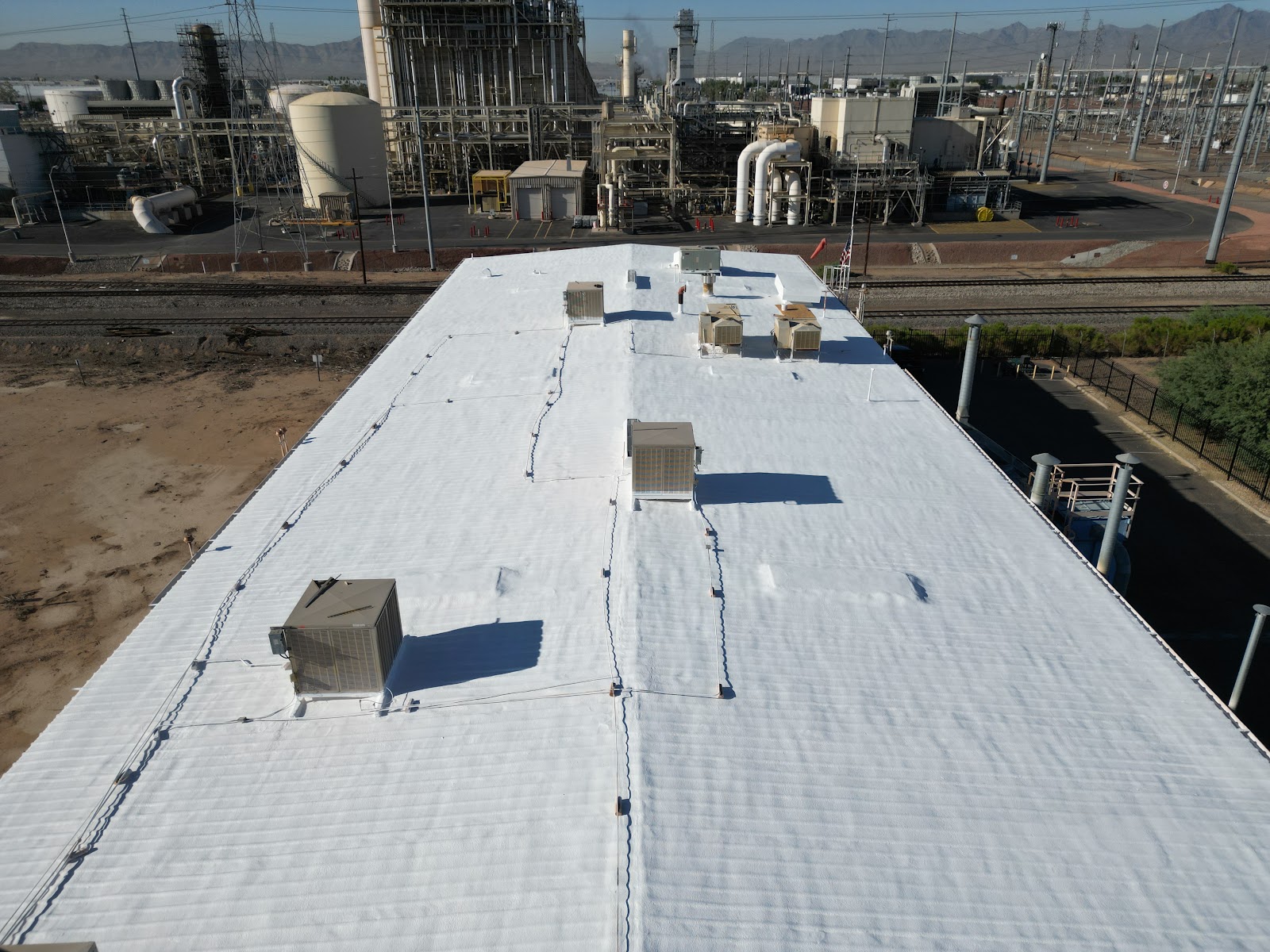Spray Foam on a Commercial Metal Roof photo 5