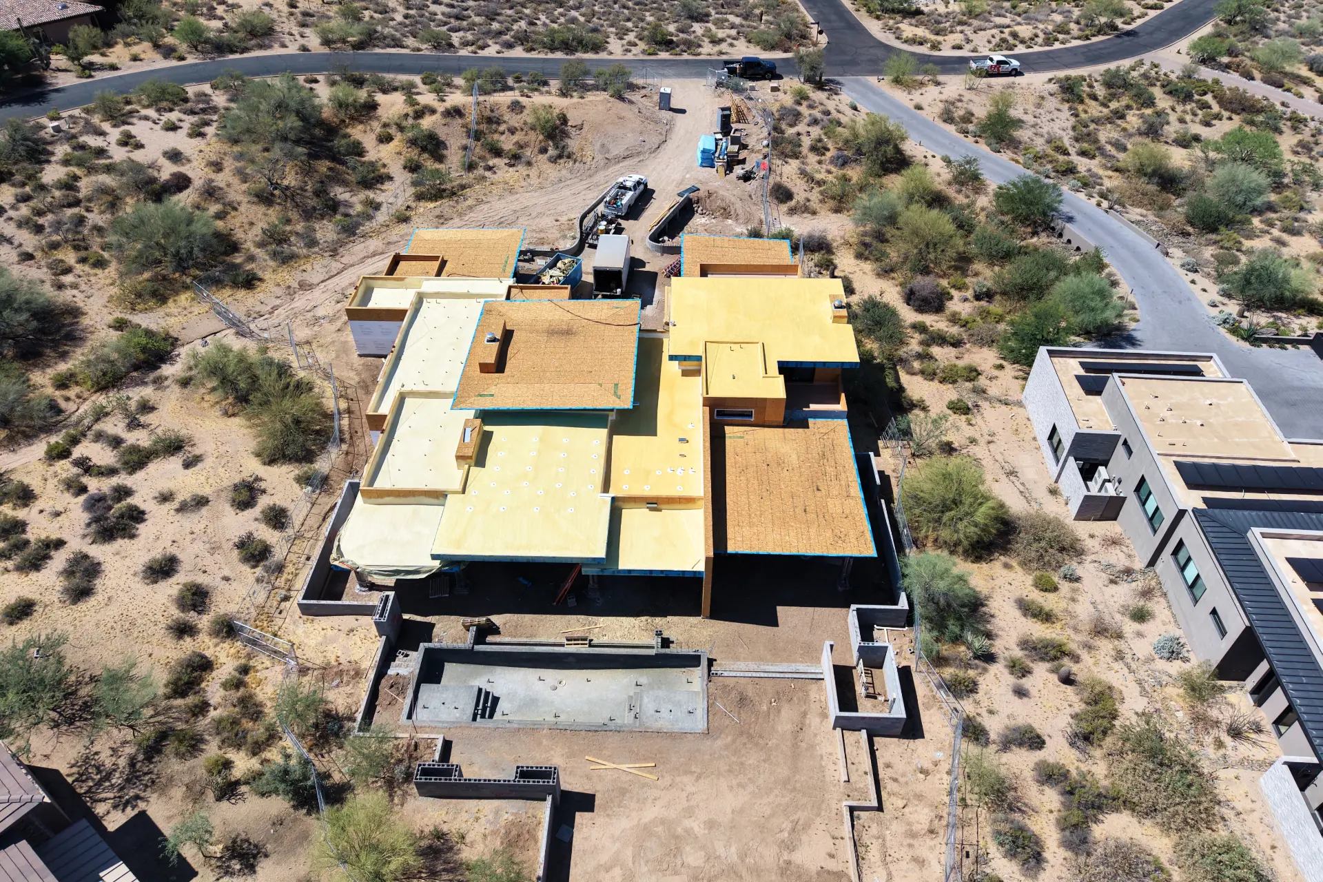Spray foam roof application on a modern desert home