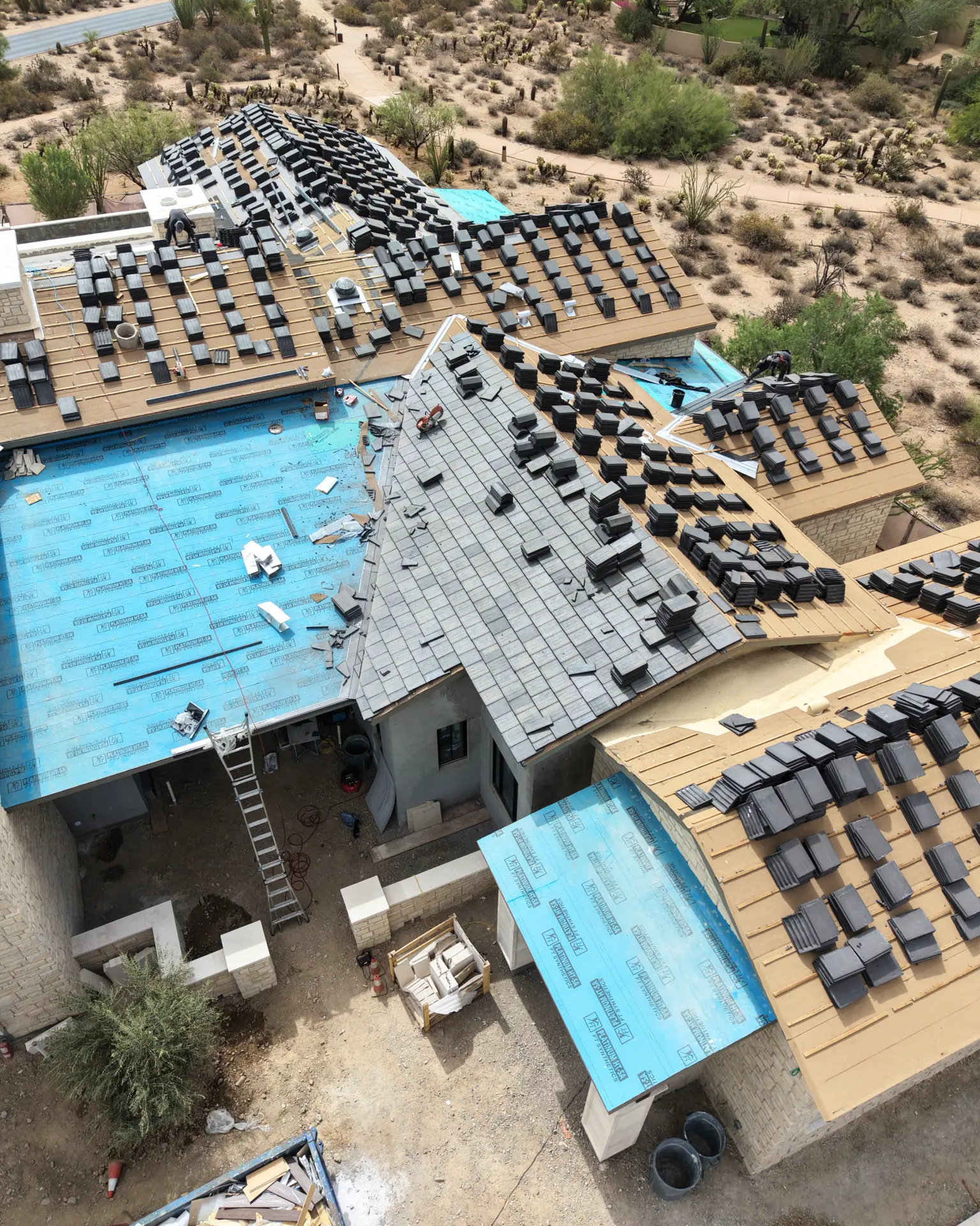 Tile load out and underlayment on a desert re-roof