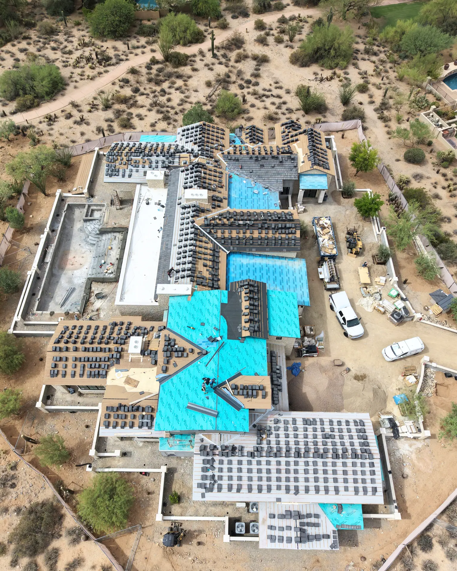 Overhead view of a full tile re-roof in progress on a Valley estate