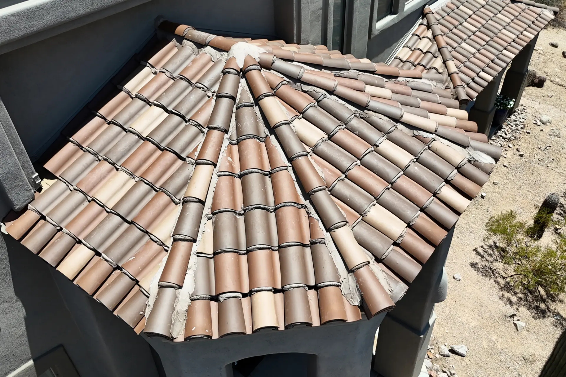 Clay barrel tile roof on a turret style entry feature