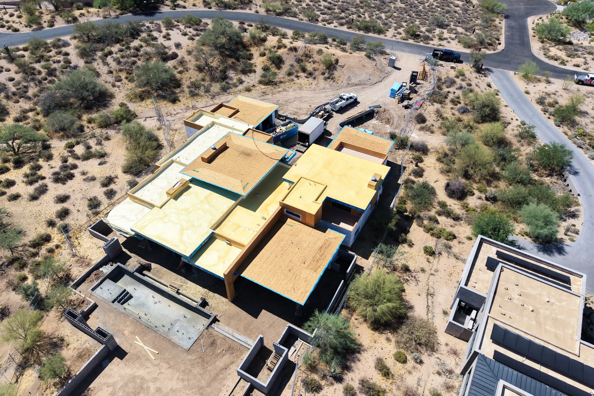 Spray foam roof applied over new decking on a desert custom home