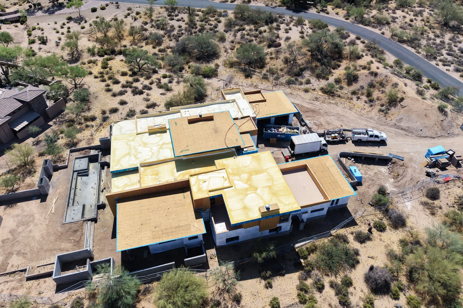Spray foam roof applied to a flat roof desert residence