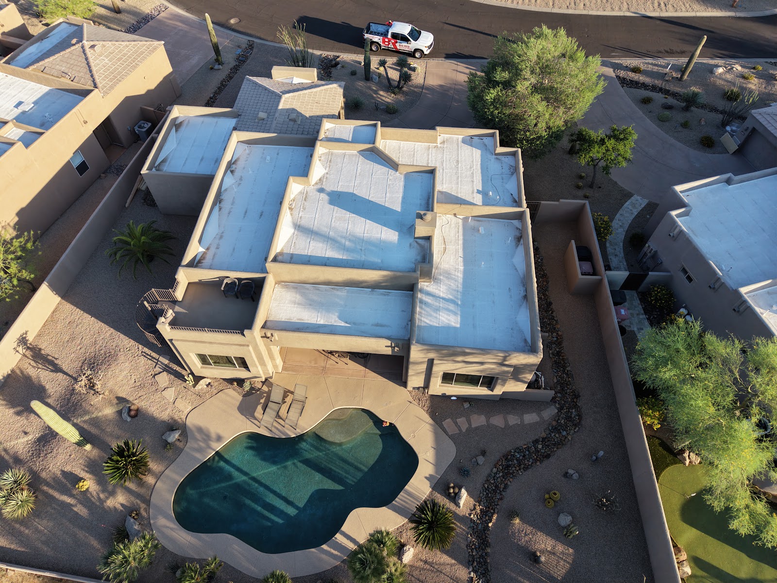 Tile Underlayment Replacement and Flat Roof Re-coat photo 6