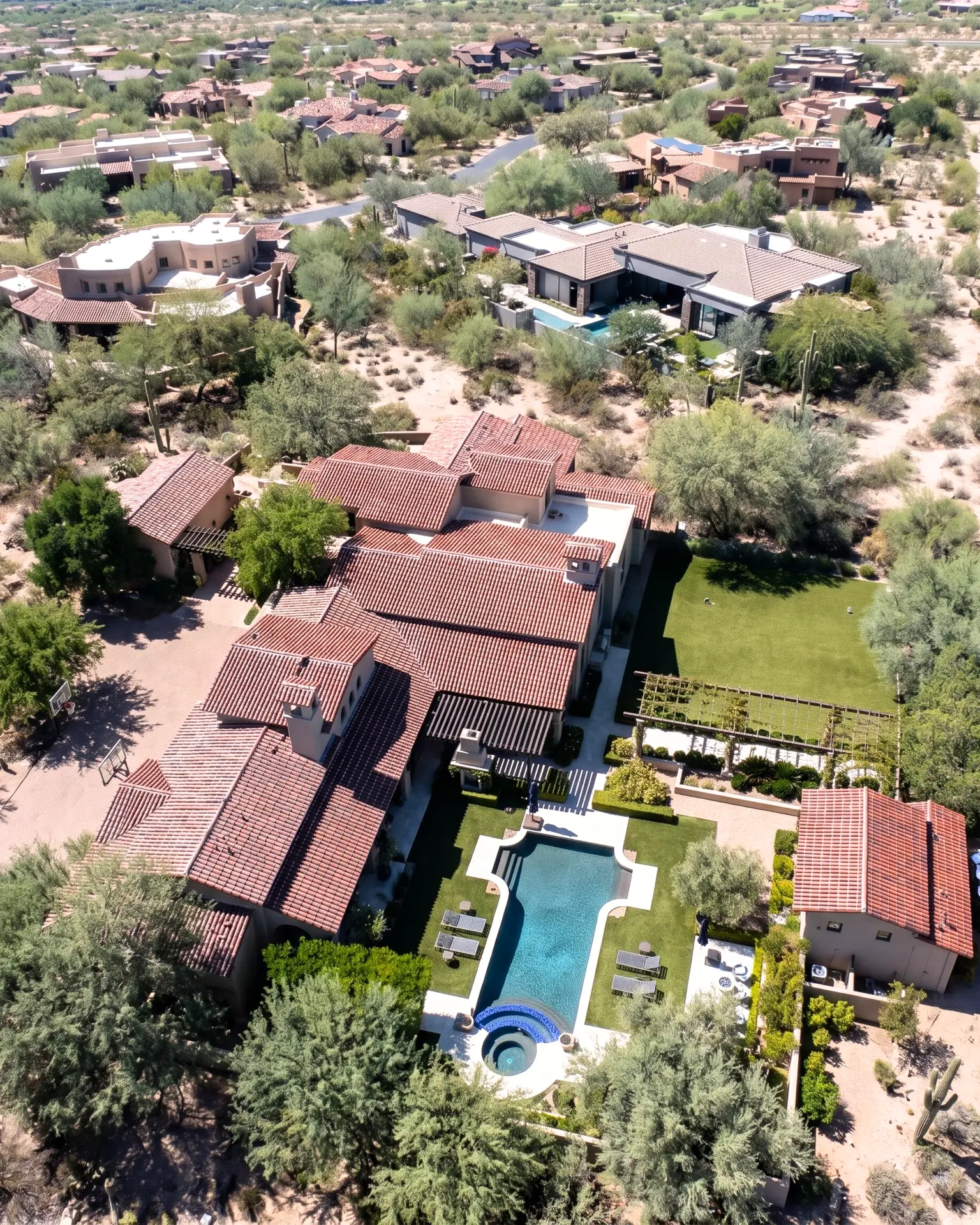 Aerial view of a completed clay tile roof on a Scottsdale estate